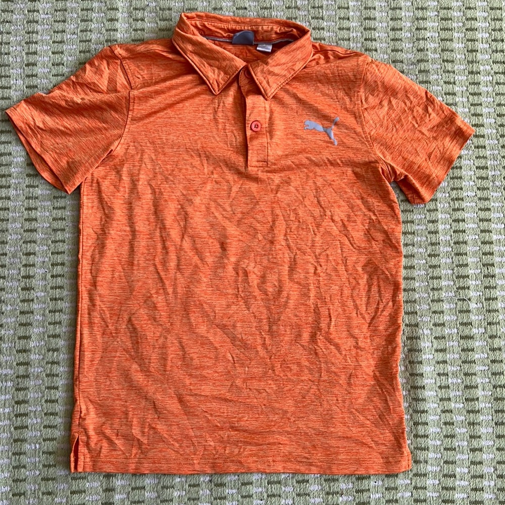 Boys Puma orange polo in size L(14-16)